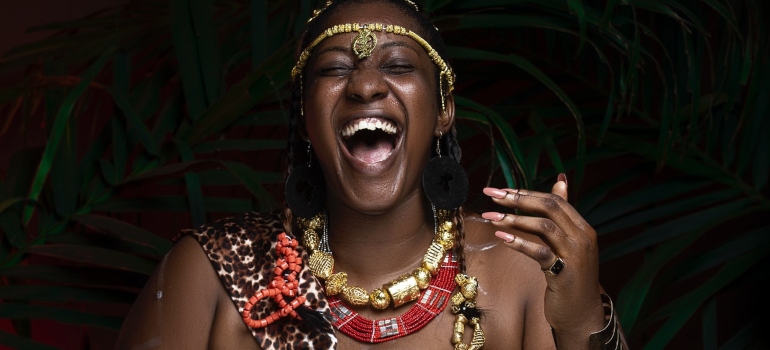 A member of an African tribe wears traditional jewelry.