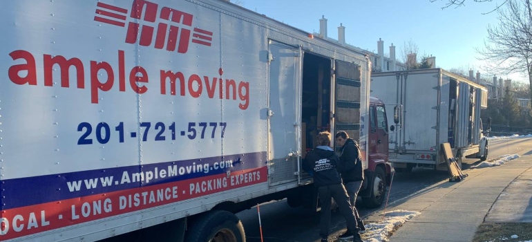 Movers in front of a truck